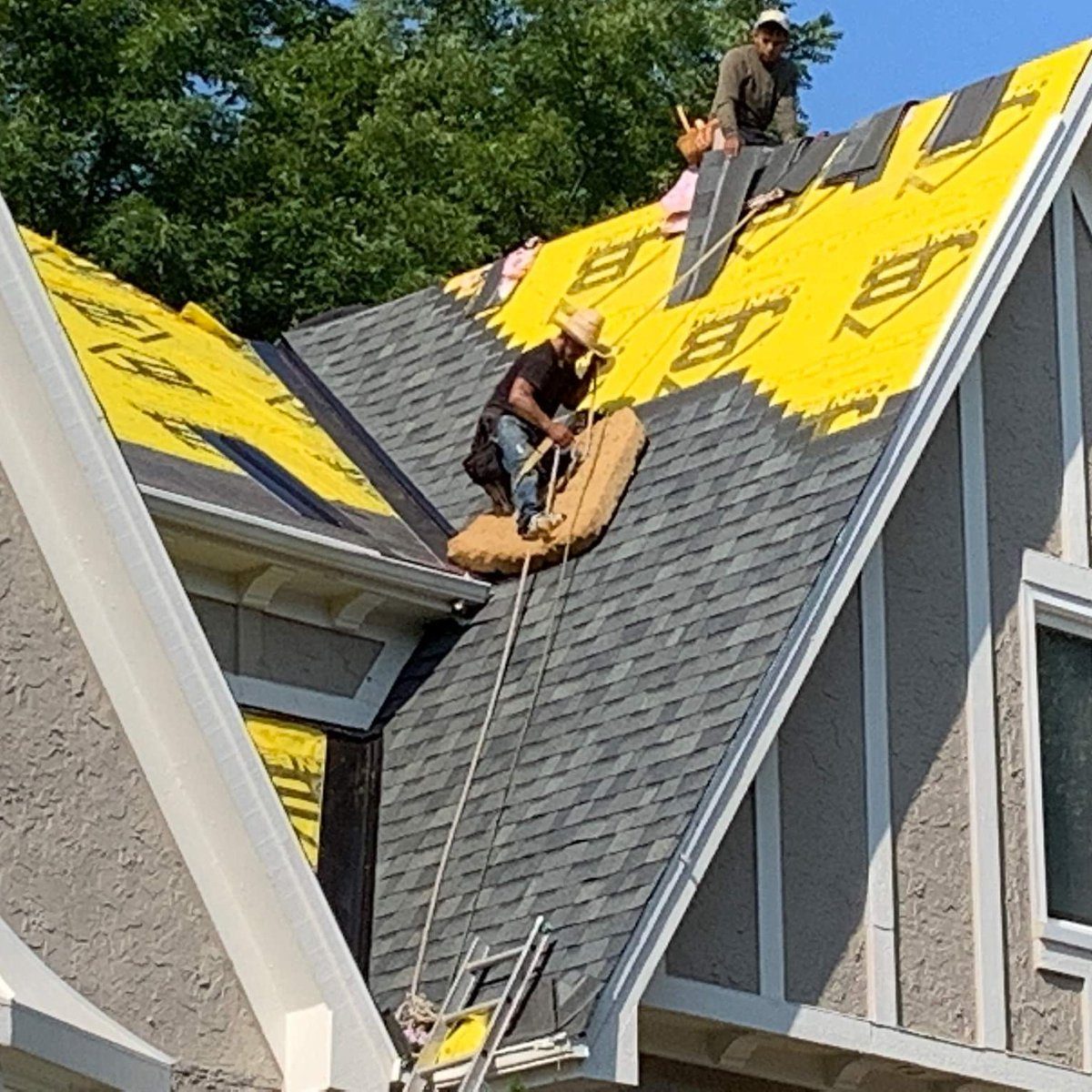 John Beal Roofing employee crew at work on a St. Louis roof