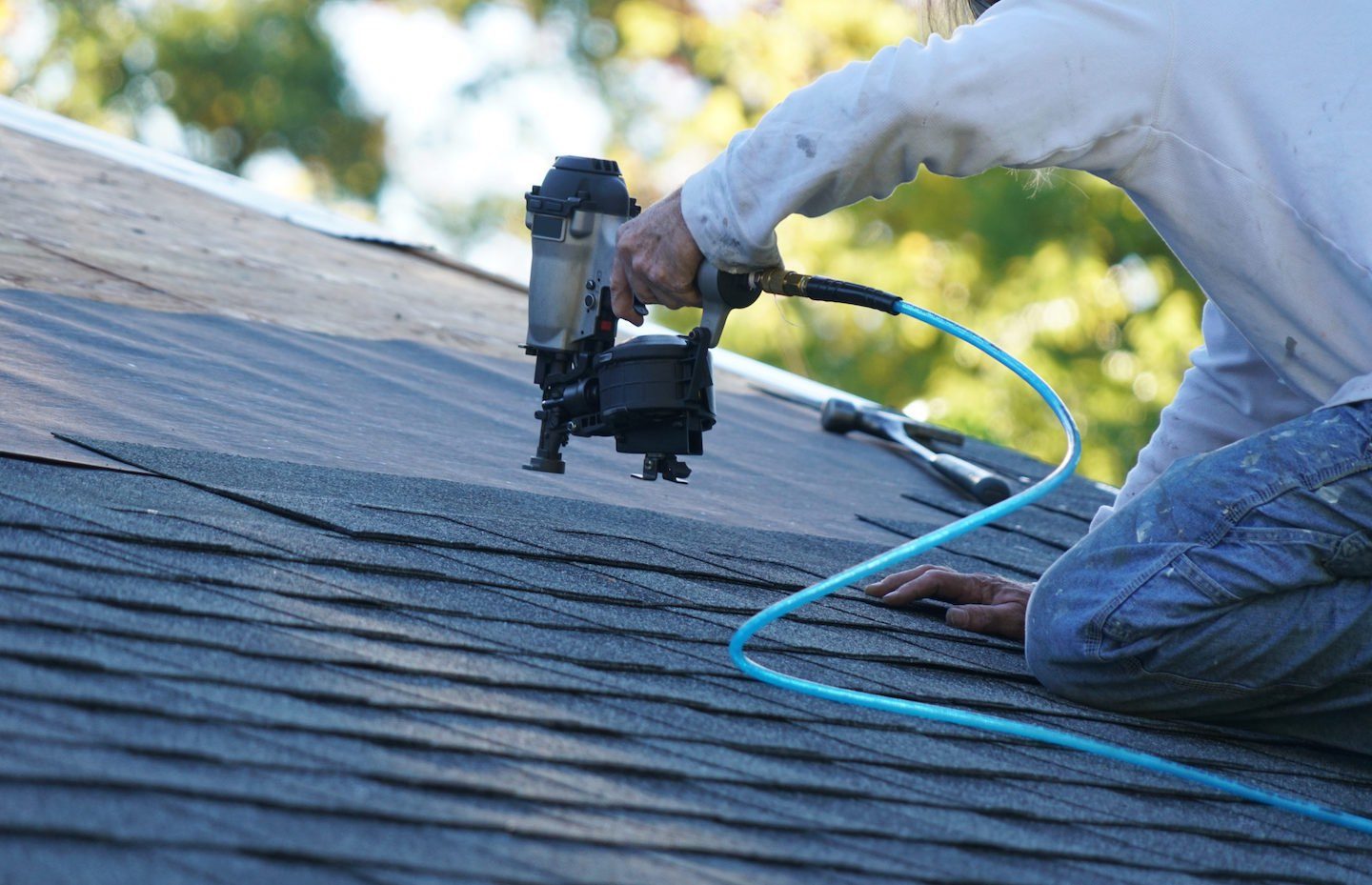 Flashing and shingle detail work on a St. Louis roof repair
